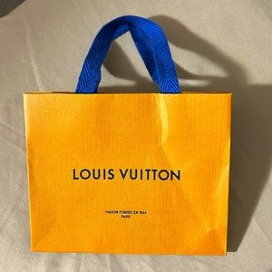 Louis Vuitton Vibrant Orange Bag with Blue Handles